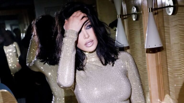 Kim Kardashian smiles at fans during getaway with Lewis Hamilton in Tokyo kim kardashian gown